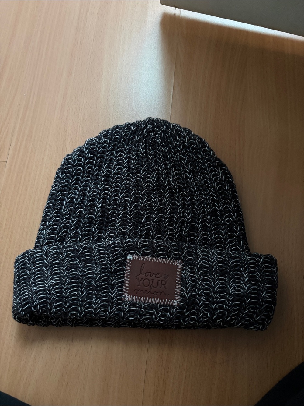 Love Your Melon Black & White Marled Knit Beanie with Leather Patch